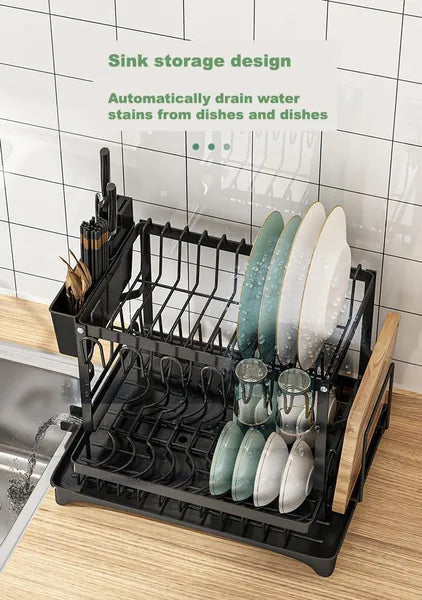 Black dish rack with dishes on a kitchen counter