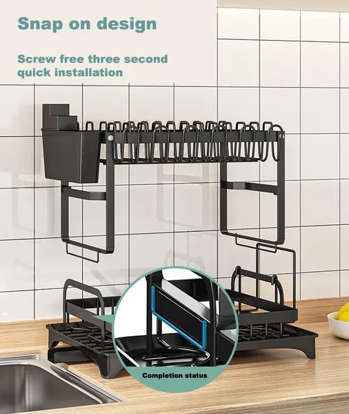 Black dish rack with snap-on design on a kitchen counter.