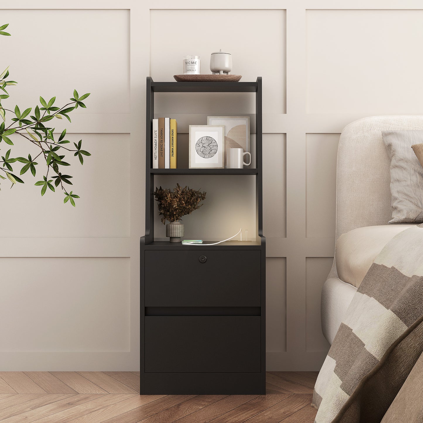 Black nightstand with decorative items next to a bed in a bedroom setting