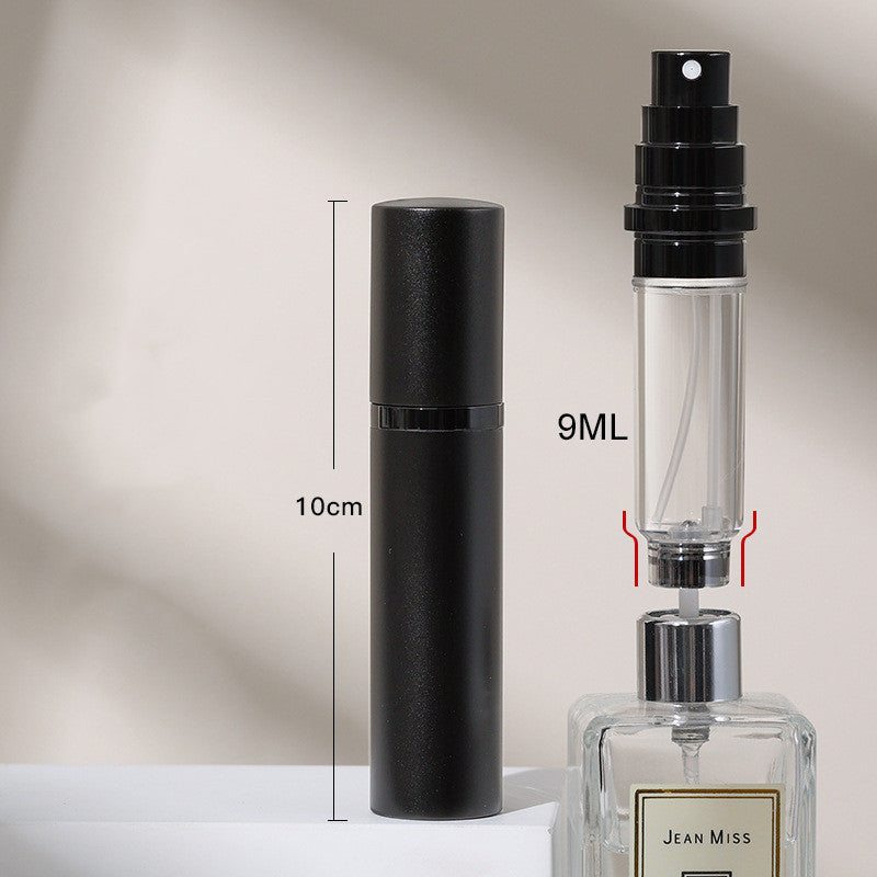 Black spray bottle with measurement details on a neutral background