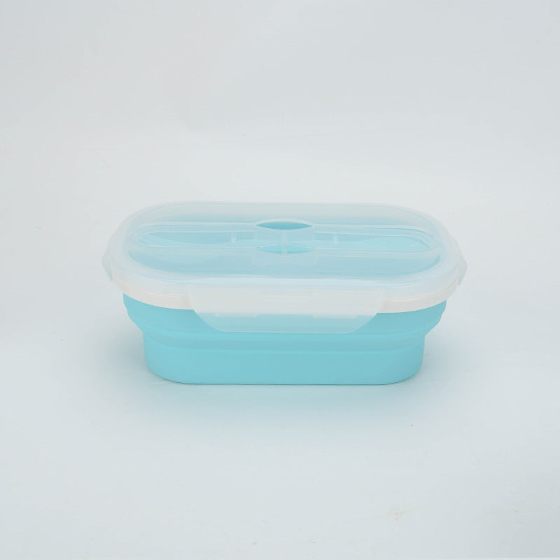 Blue silicone food container with a white lid on a light gray background