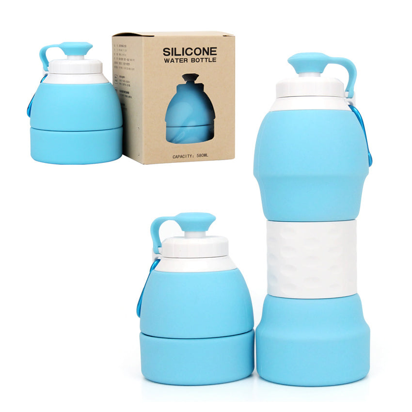 Blue silicone water bottle with packaging on a white background
