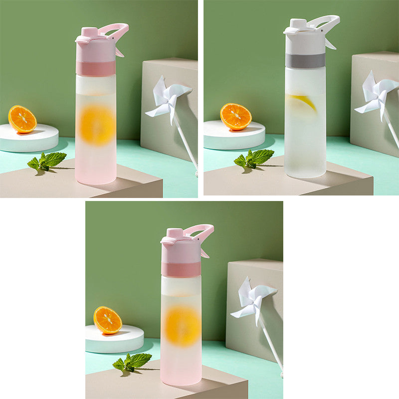 Collage of a pink water bottle with lemon slices and mint leaves on a green background.