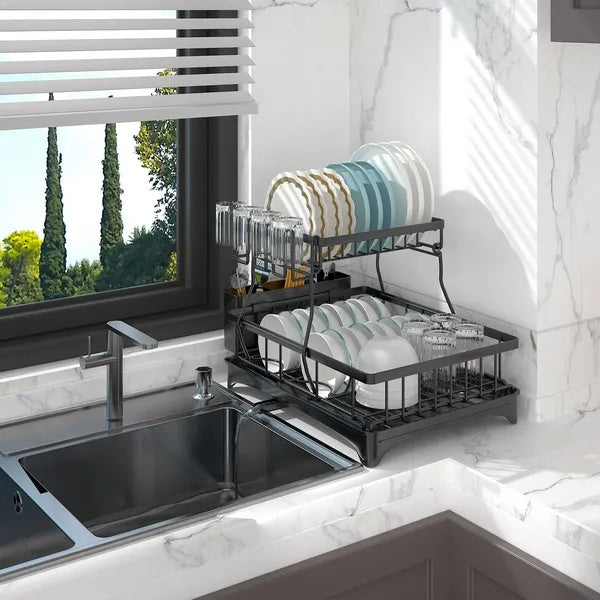 Dish drying rack on a kitchen counter with a window view