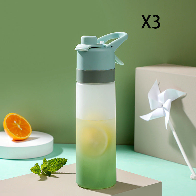 Gradient water bottle with lemon design on a green background