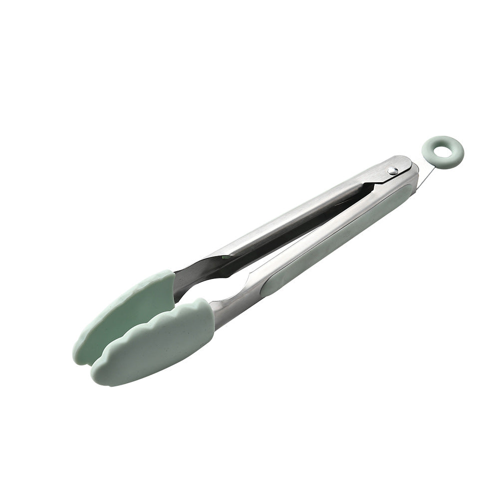 Kitchen tongs with green silicone handles on a white background