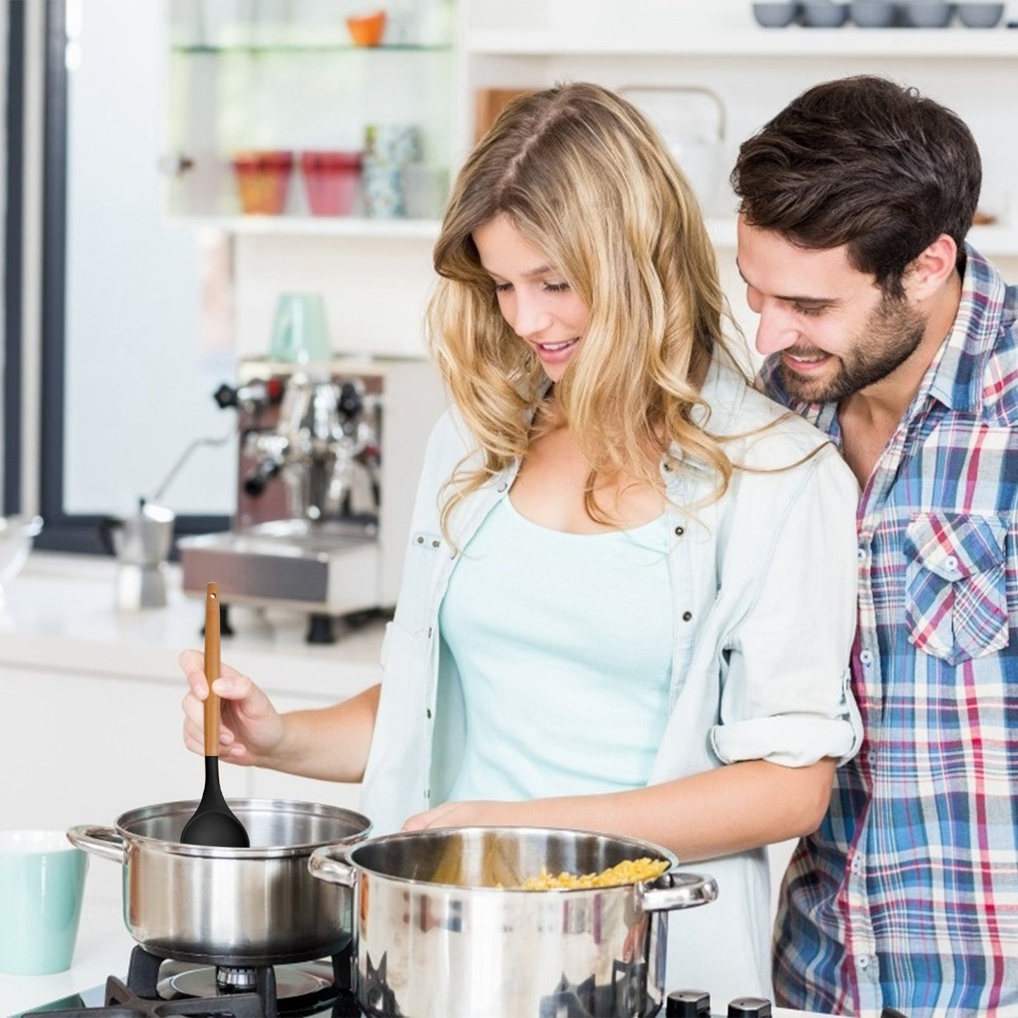 Man and woman cooking together in a kitchen