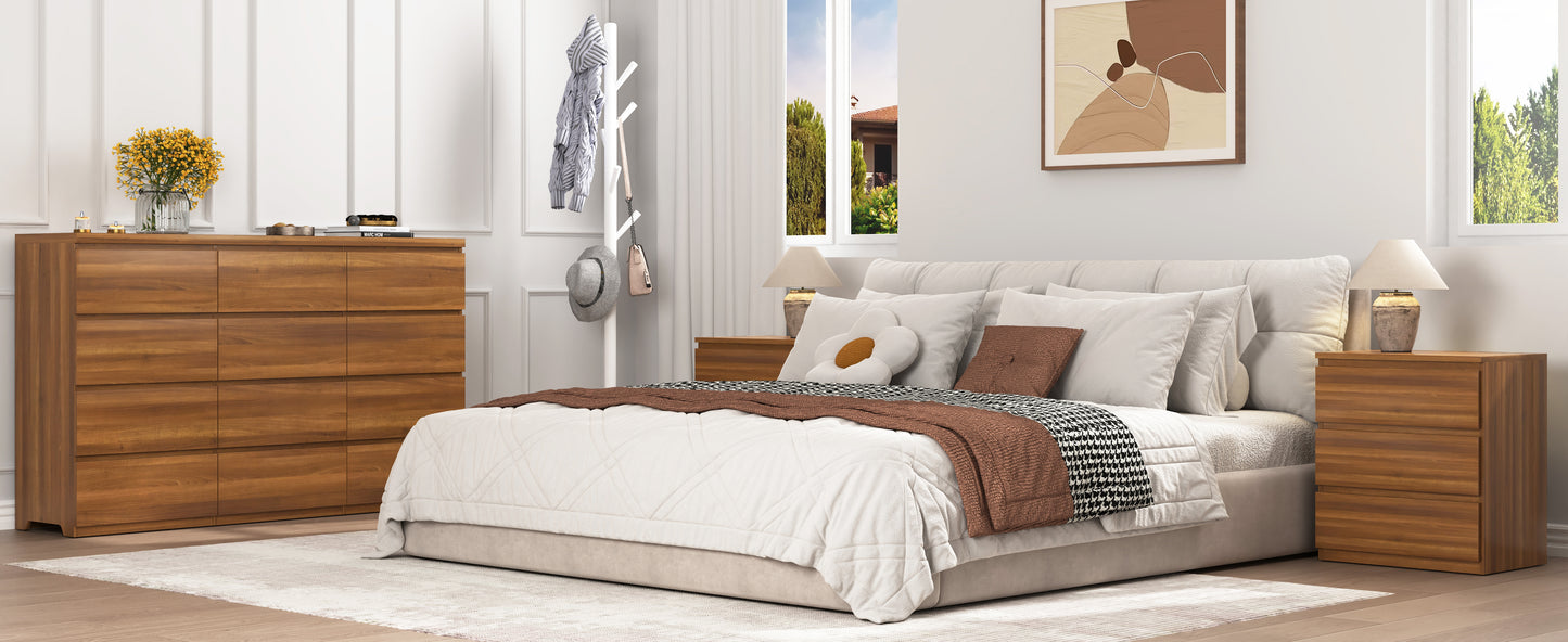 Modern bedroom with a bed, dresser, and nightstands.