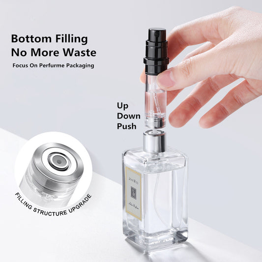 Perfume bottle with a focus on its filling mechanism and text indicating 'Bottom Filling No More Waste'.