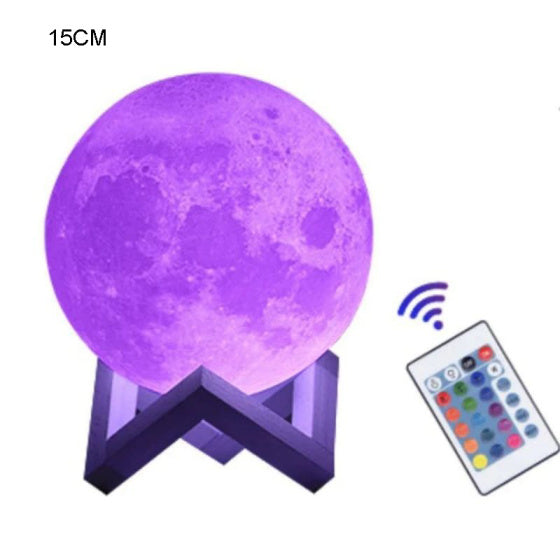 Purple moon-shaped lamp with remote control on a white background