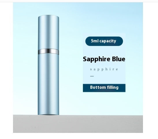 Sapphire blue cosmetic bottle with 5ml capacity on a light blue background