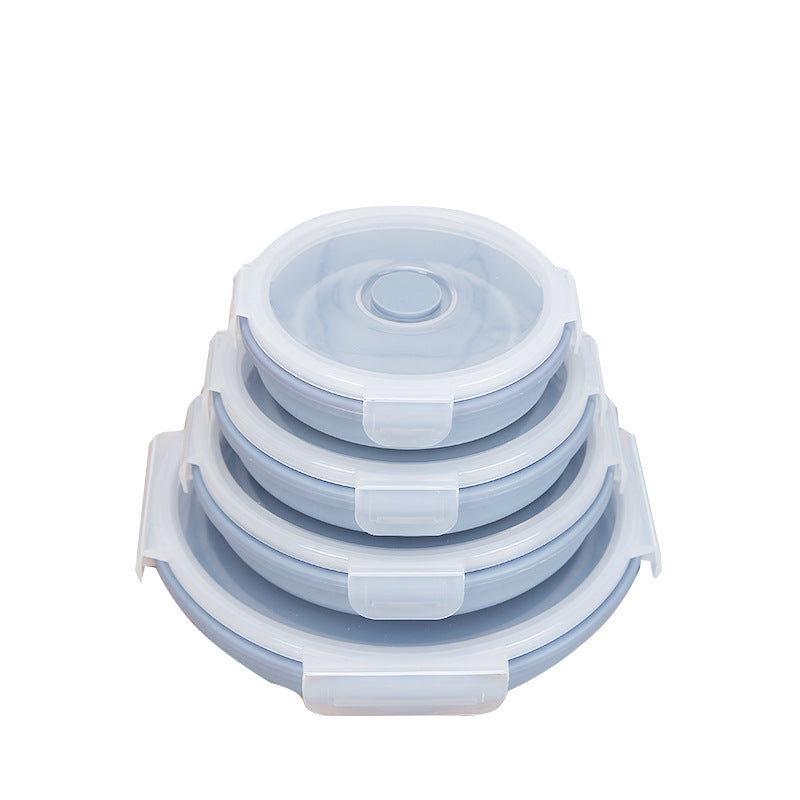 Set of four silicone food storage lids on a white background