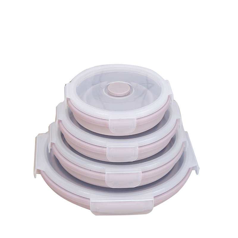 Set of three collapsible silicone containers with lids on a white background