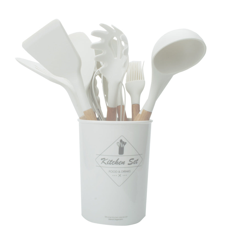 Set of white kitchen utensils in a container labeled 'Kitchen Set' on a white background