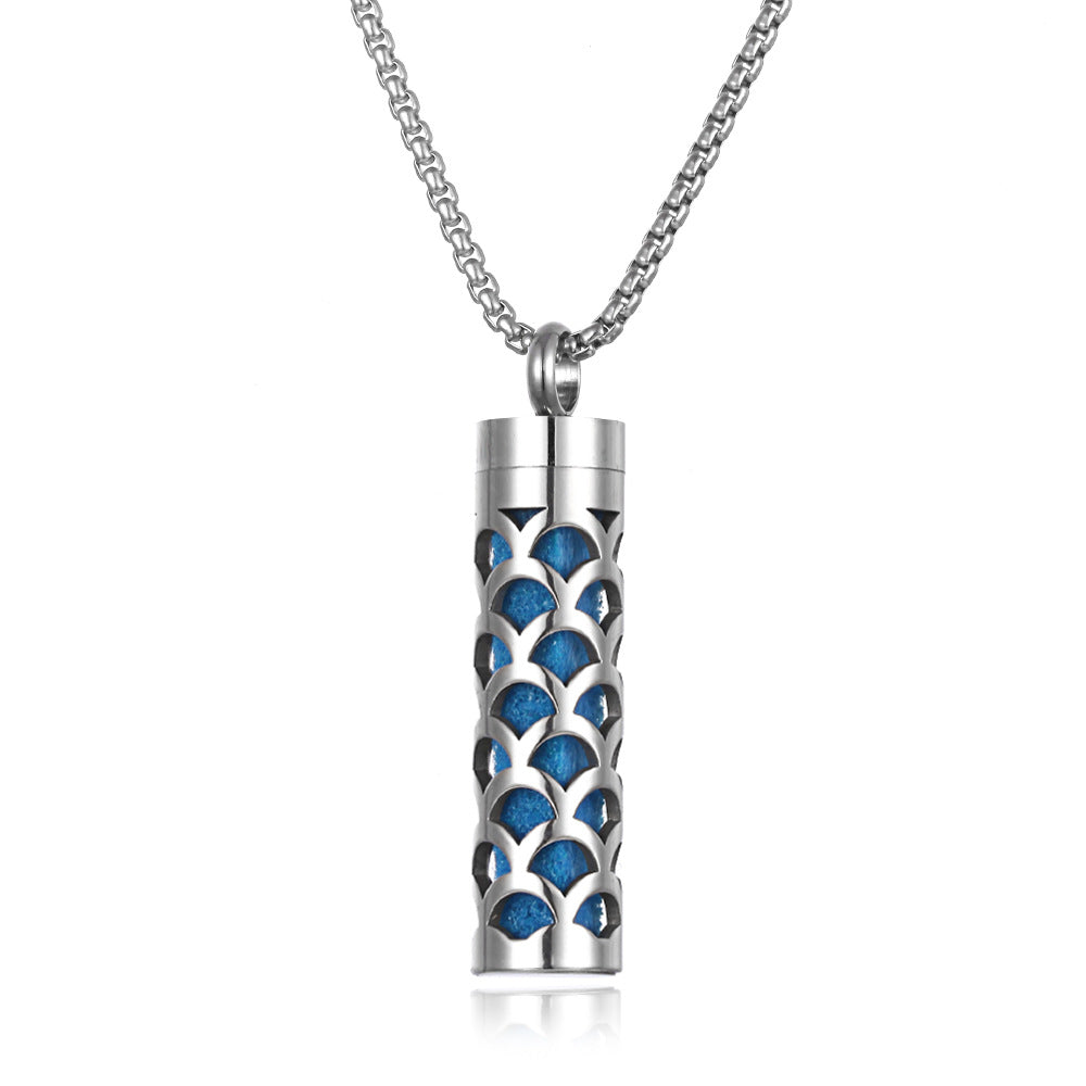 Silver cylindrical pendant with blue pattern on a white background