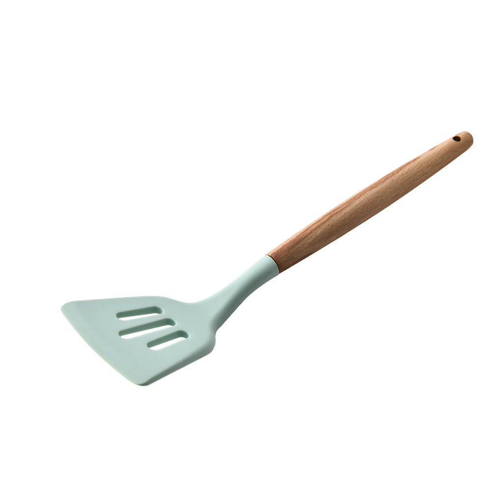 Spatula with a wooden handle on a white background