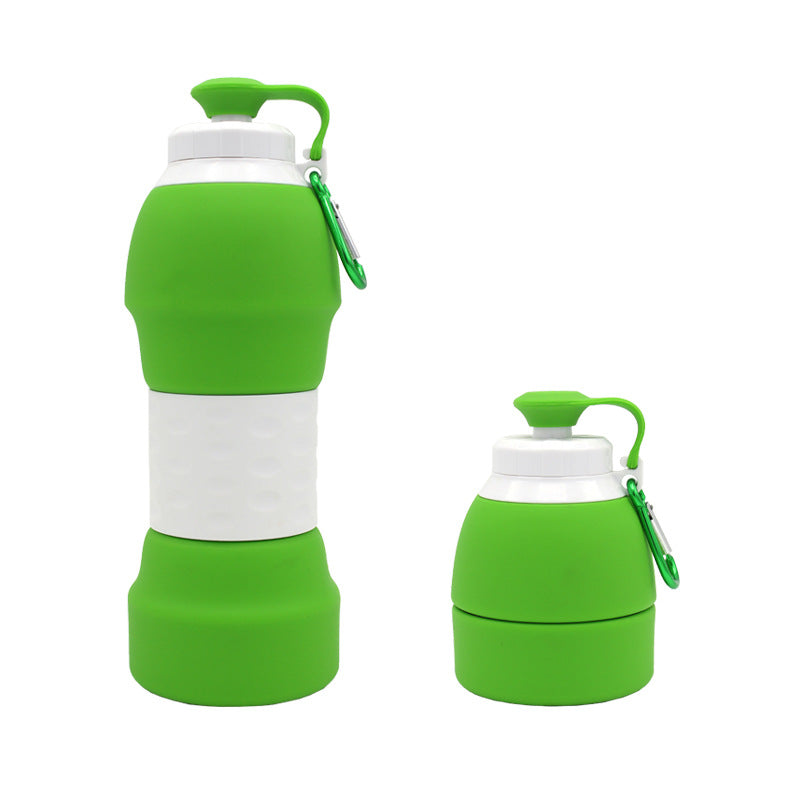 Two green and white collapsible water bottles on a white background