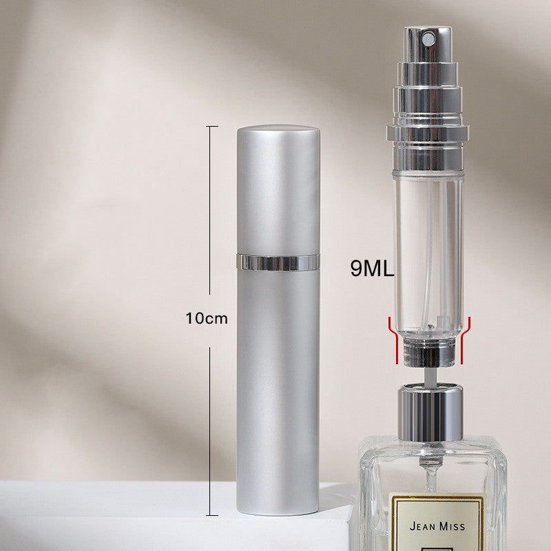 Two perfume bottles with measurement details on a neutral background