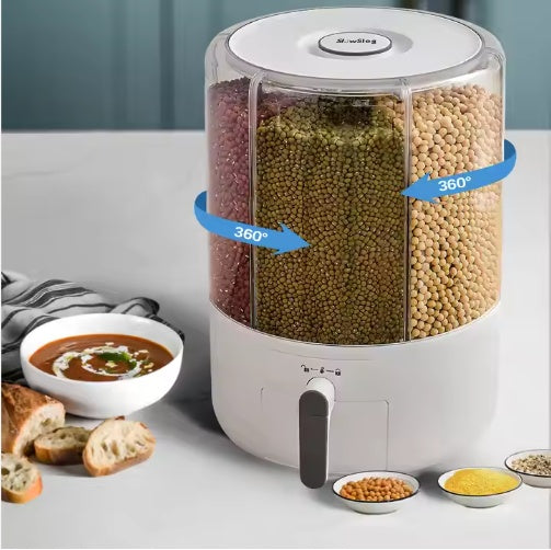 White food processor with compartments filled with various grains on a kitchen counter.