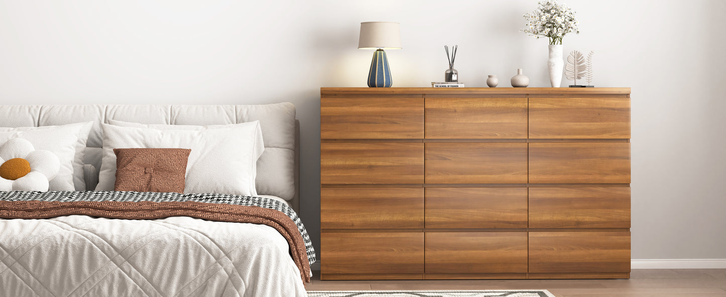 Wooden dresser next to a bed with pillows in a bedroom setting